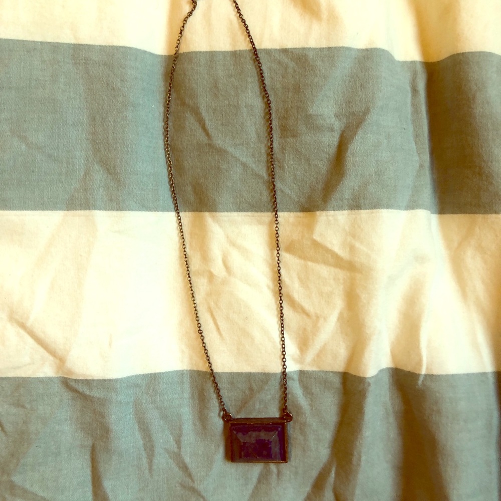 Necklace with blue, gold stone
